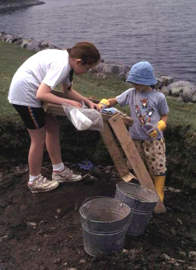 "Can You Dig It?"© participants excavating at the naval cottages in 1998.